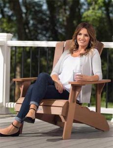 Woman Sitting in Adirondack Chair