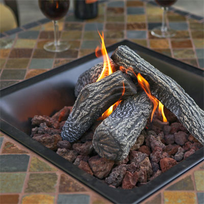 Faux Logs over Lava Rocks in Blue Rhino Firebowl