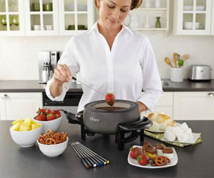 Woman Dipping Strawberry in Fondue